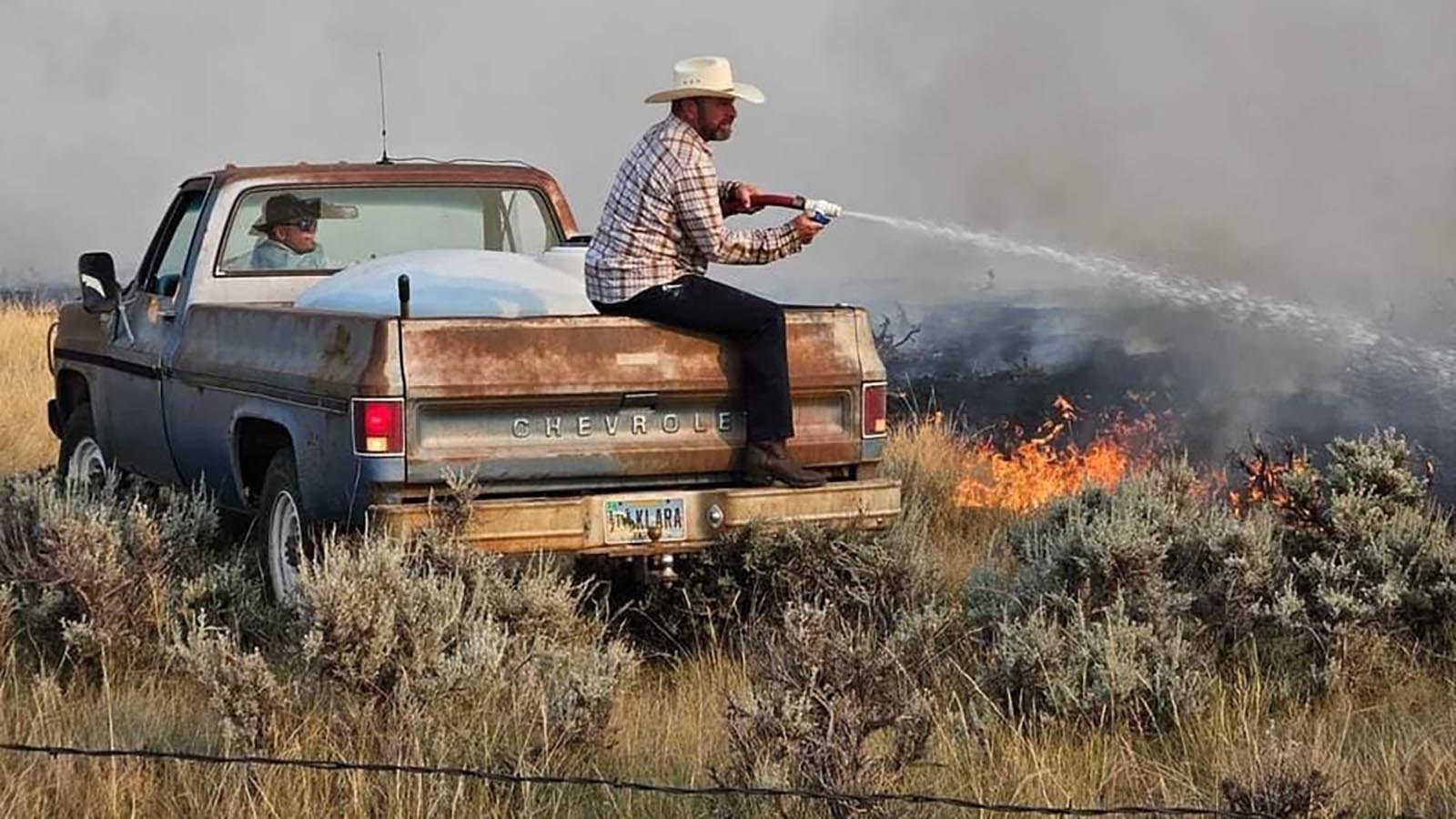 State Sen. Eric Barlow pitches in on the Beaver Creek fire outside of Gillette.