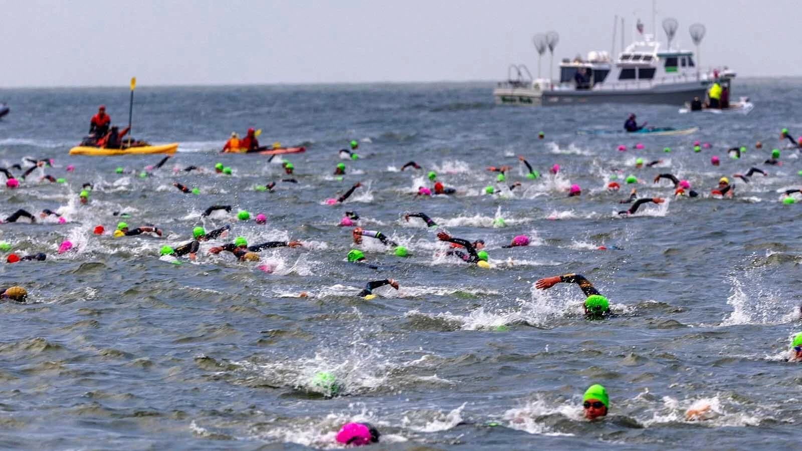 Swimmers in the water during a past triathlon.
