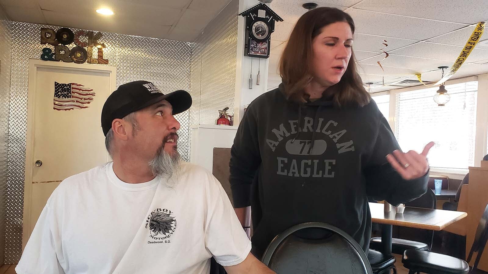 Todd Espinoza talks with one of his employees at his Cheyenne diner Espi's.