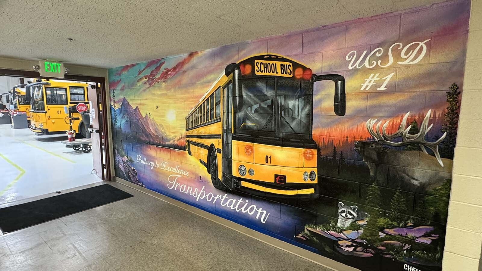 The mural Evanston artist Michelle ‘Chely’ Gomez painted for the Uinta County School District’s bus barn.