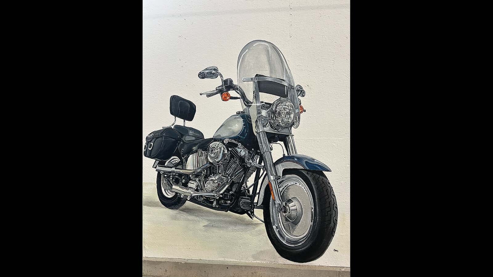 Evanston artist Michelle ‘Chely’ Gomez painted this Harley-Davidson for local business owner Scott Kallas; it can be found in the stairwell of his shop.