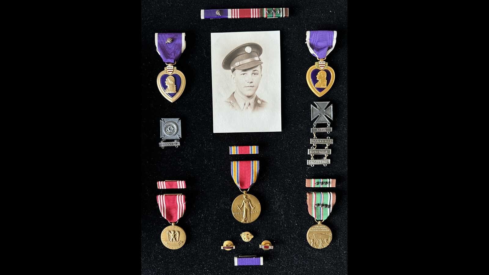  The Purple Hearts and other medals and ribbons Everett Mann earned in World War II.