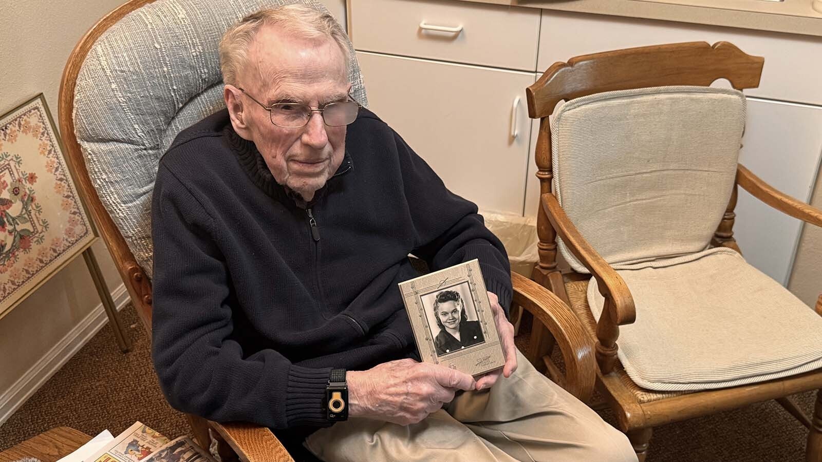 Everett Spackman holds a photo of his wife of 69 years, Eunice Erdene Spackman.