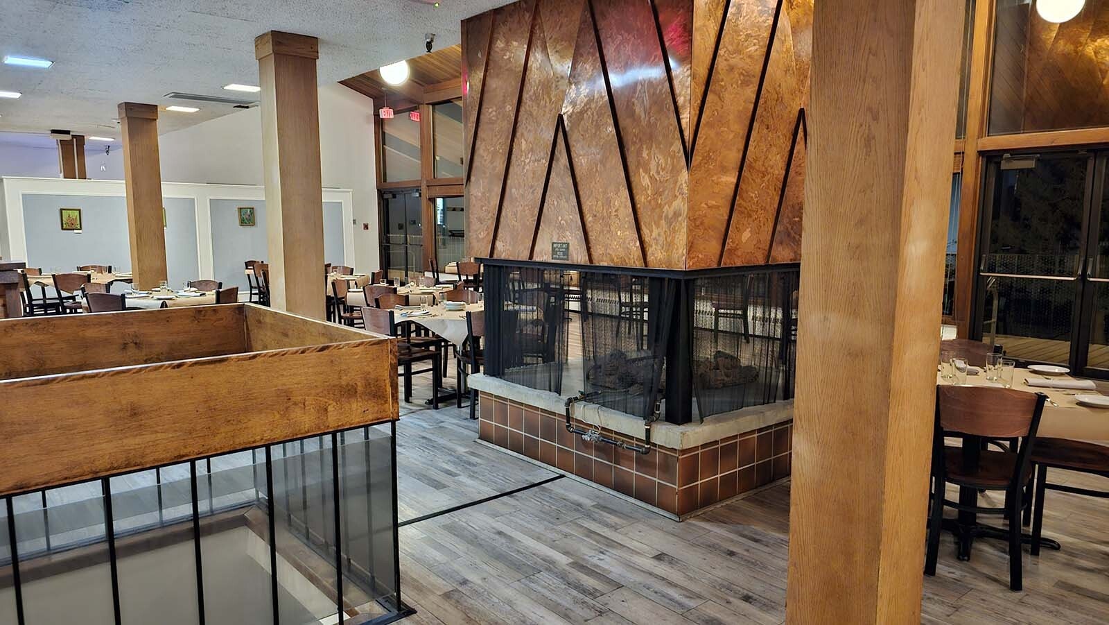 A huge coppery fireplace in the center of the restaurant makes the space feel cozy in winter.