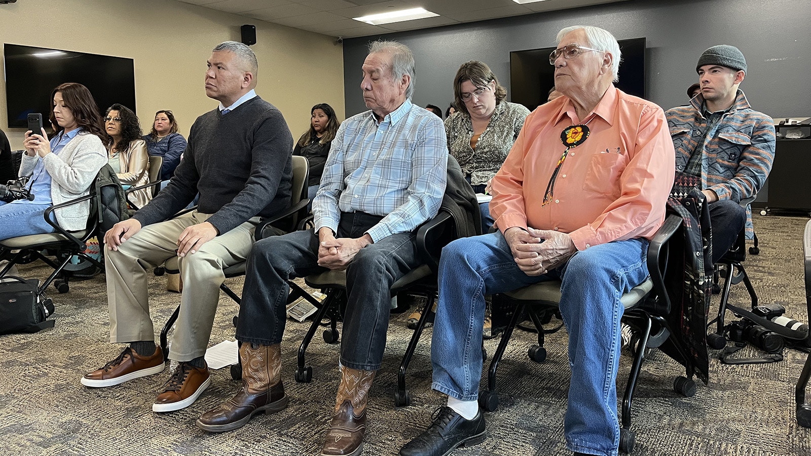 Eastern Shoshone Business Council Member John Washakie, right, and other Wyoming tribal members and press at a Feb. 8 FBI press conference to address murders and other crimes.