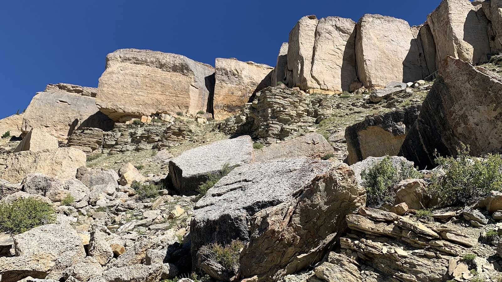 Believe it or not, Falling Rock in Wyoming's Bighorn Mountains is a giant 75-foot square boulder that is all natural. No human or alien influences shaped this huge cube. Above it is the cliff face where it and other boulders broke off the mountain.