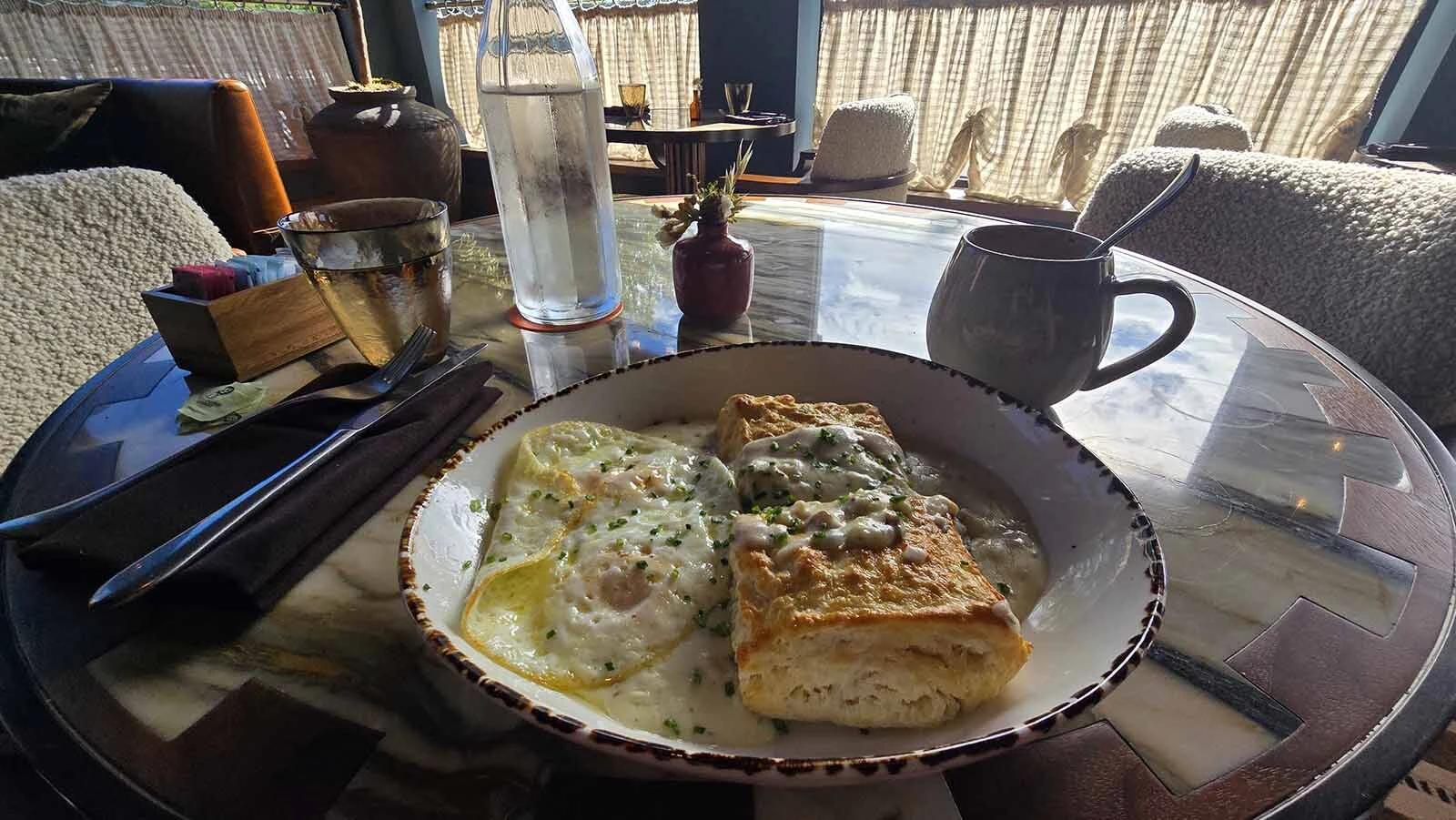 Biscuits with gravy and farm eggs at Sure Hand, Faraway Jackson Hole’s all-day restaurant.