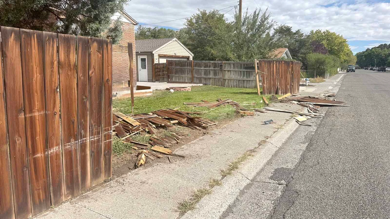 What's left of the wooden fence around a Cody home's backyard after a hit-and-run driver took it out just after midnight Wednesday, Sept. 23, 2026.