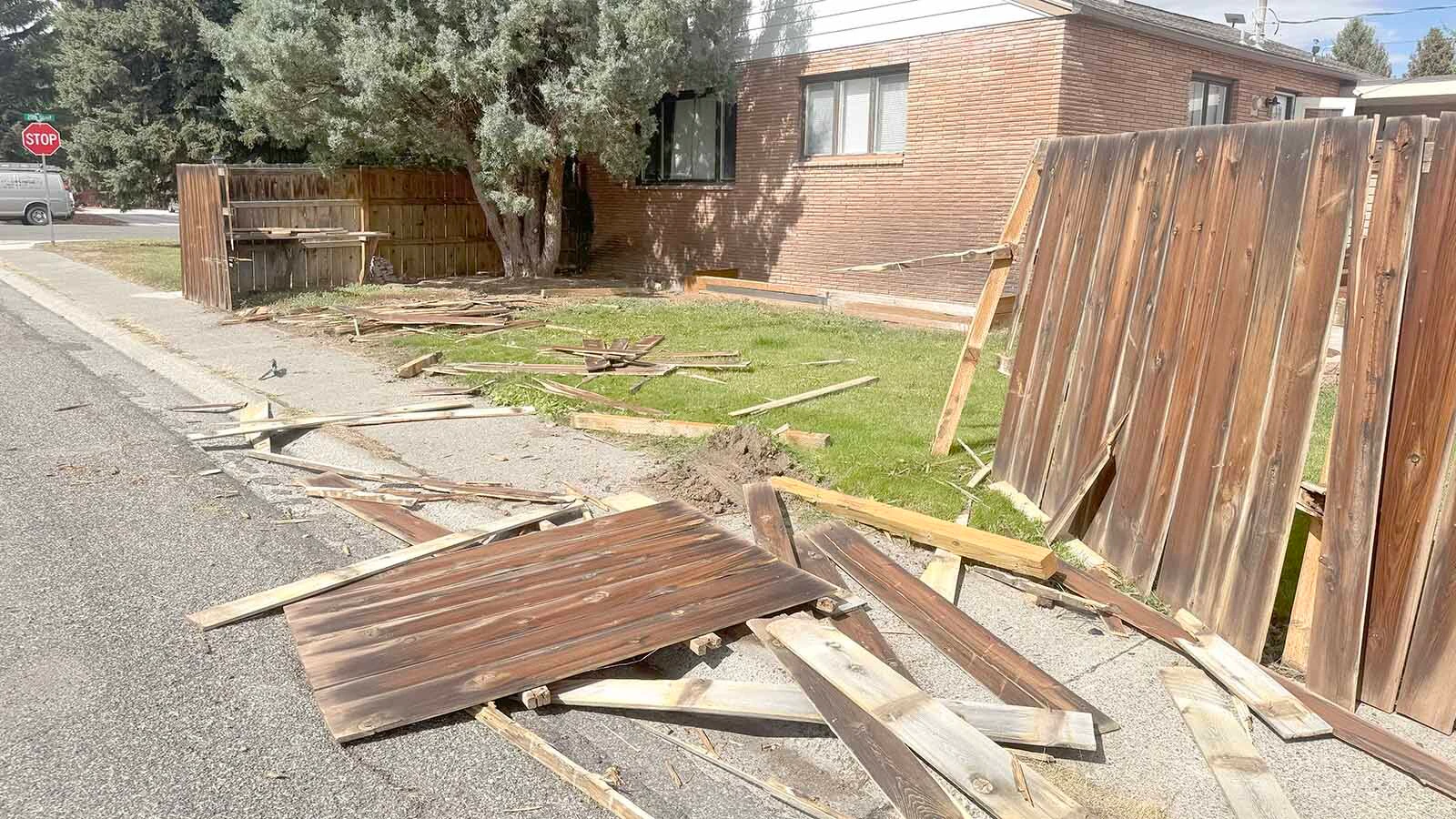 What's left of the wooden fence around a Cody home's backyard after a hit-and-run driver took it out just after midnight Wednesday, Sept. 23, 2026.