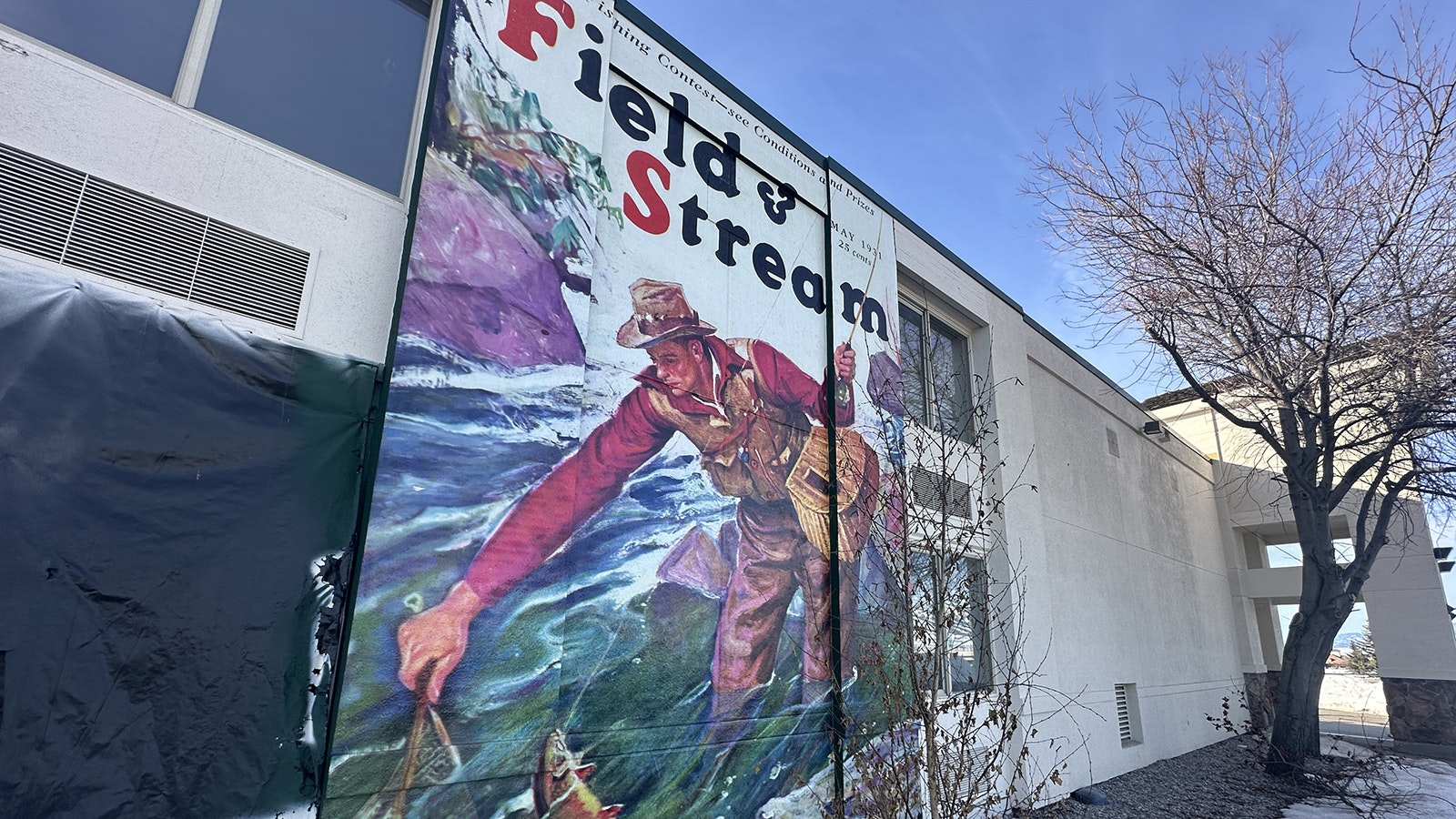 A two-story mural at the new Field & Stream Bozeman Lodge, now under construction in Bozeman, Montana.