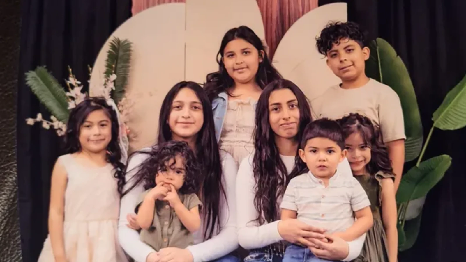 The extended Benitez family includes eight children.