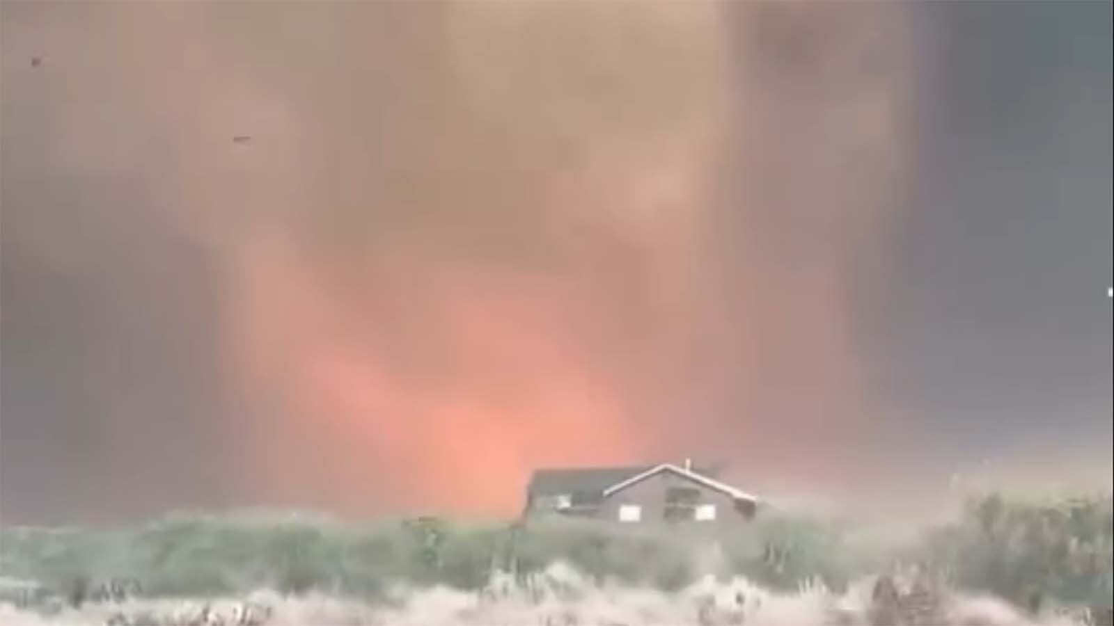 An image from a dramatic video posted by The Hotshot Wake Up of a giant "fire devil" in the Deer Creek Fire in Utah.