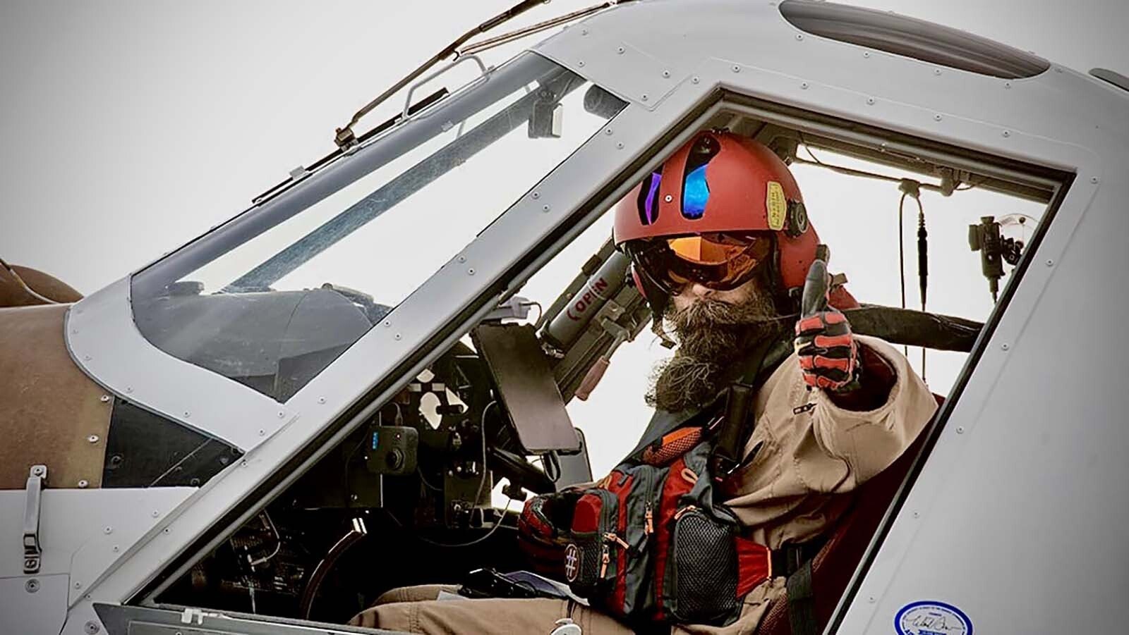 Pilot Nick Dew of Washington state has been flying his Tanker 837 since late May, fighting wild fires in Wyoming. He said that he has flown over 20 fires so far and will be fighting the fires from the air into September.