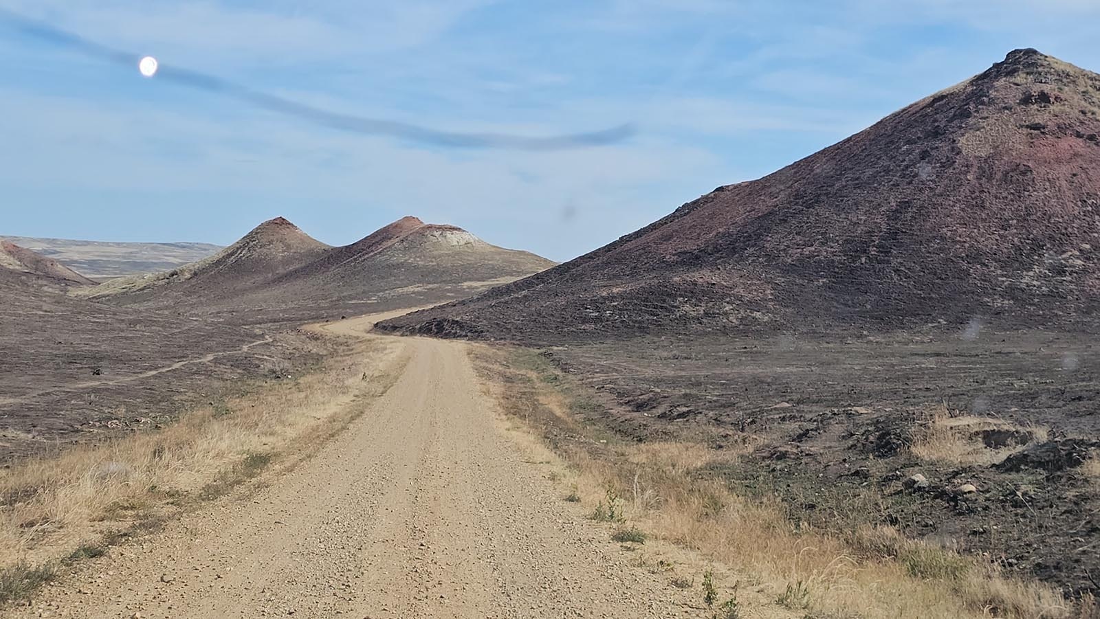 The burned land stretches on for miles and miles.