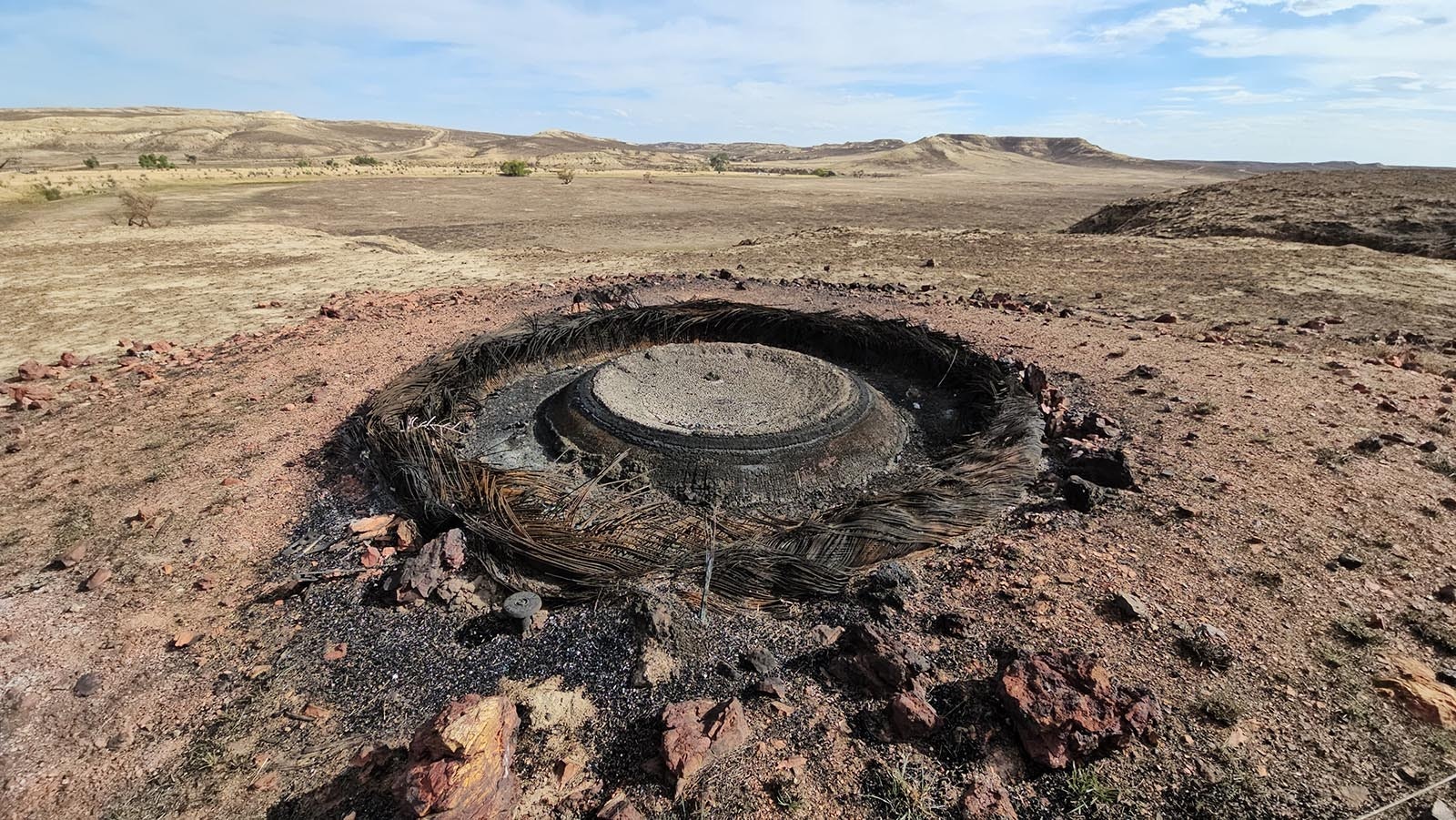 water tank made out of a huge tire is among infrastructure burned up on David Belus' ranch in Johnson County.