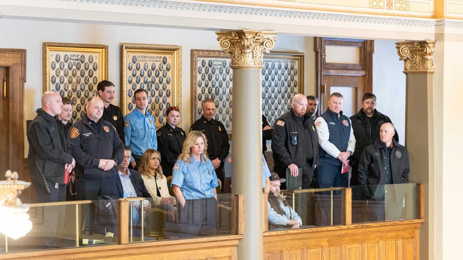 A group of Wyoming firefighters and law enforcement officers filled the state Capitol in Cheyenne on Wednesday to protest a proposed 50% property tax cut. They say it could gut the budgets of their local departments.