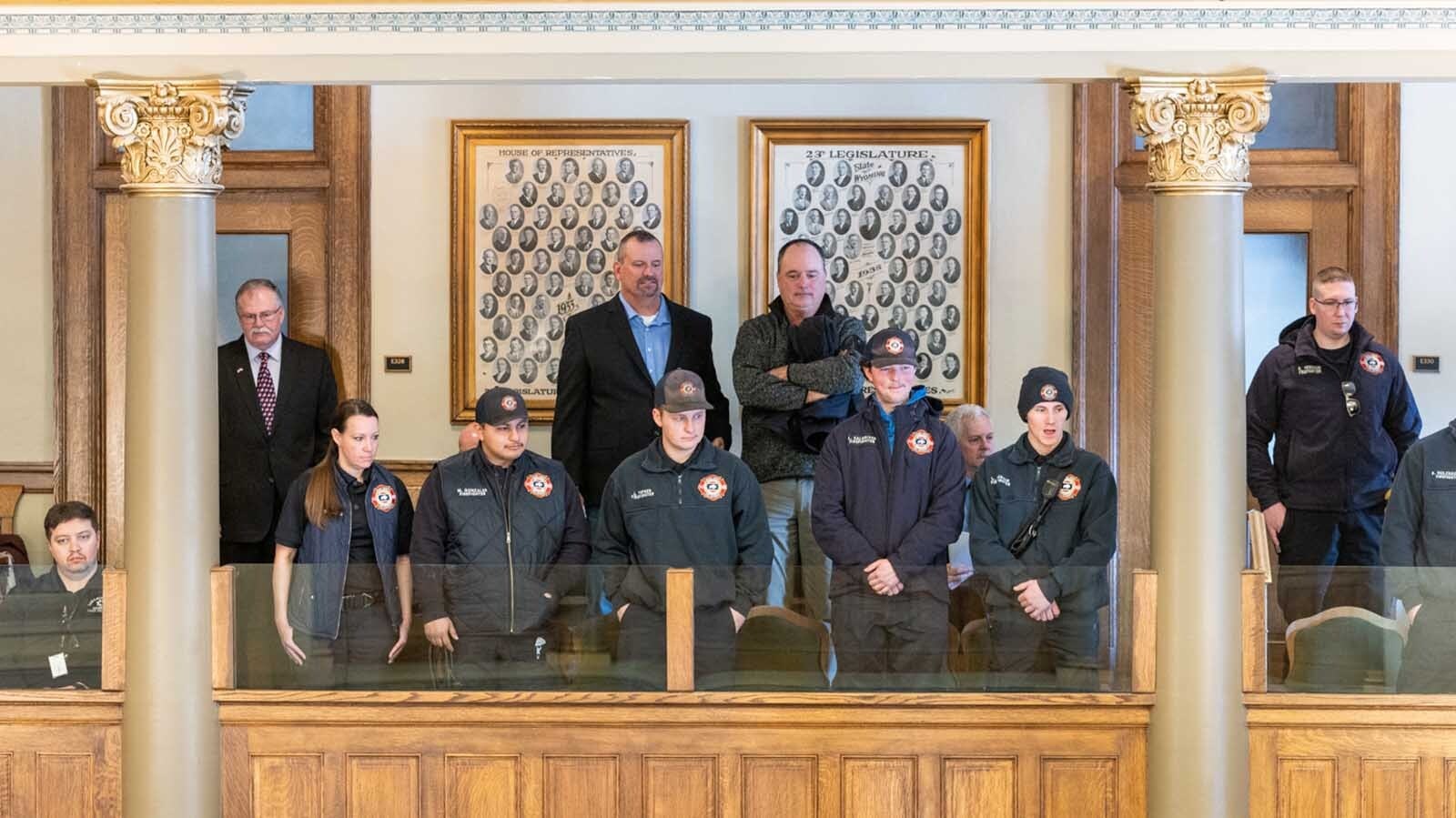 A group of Wyoming firefighters and law enforcement officers filled the state Capitol in Cheyenne on Wednesday to protest a proposed 50% property tax cut. They say it could gut the budgets of their local departments.