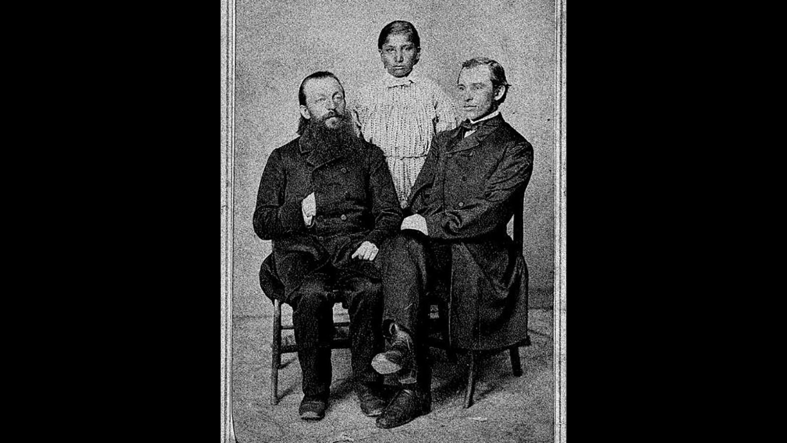 Missionary Karl Krebs, left, Brown Moccasin and missionary Christian Flachenecker in Iowa, 1864. Brown Moccasin was delighted when Krebs put up a Christmas tree the previous year.