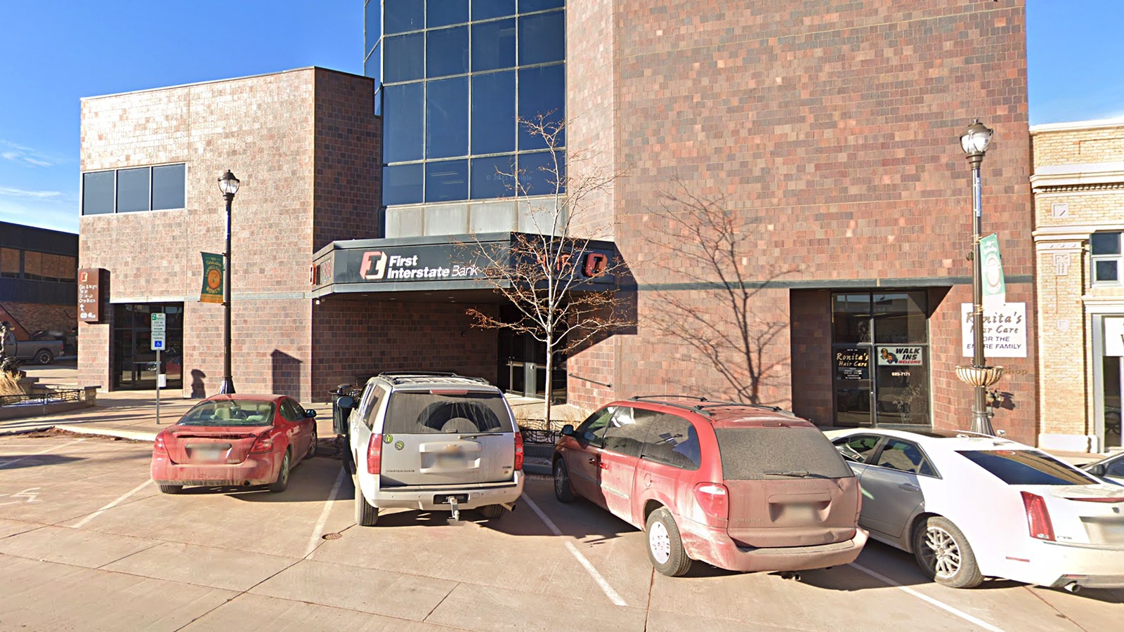 First Interstate Bank in downtown Gillette. An 87-year-old woman was allegedly being scammed by a pair of men until bank employees noticed unusual activity with her accounts.