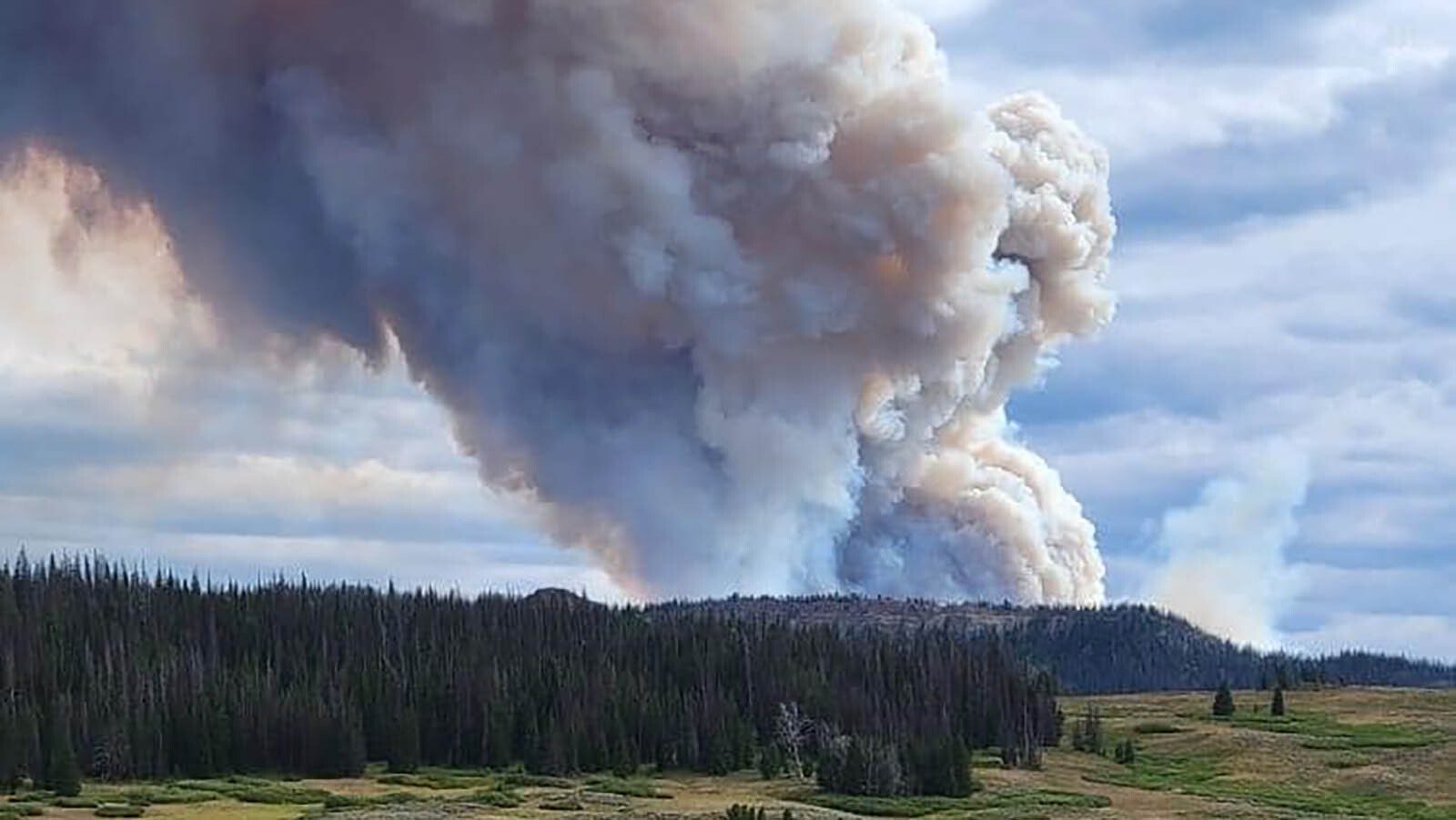 Smoke billows up from the Fish Creek Fire in northwest Wyoming.