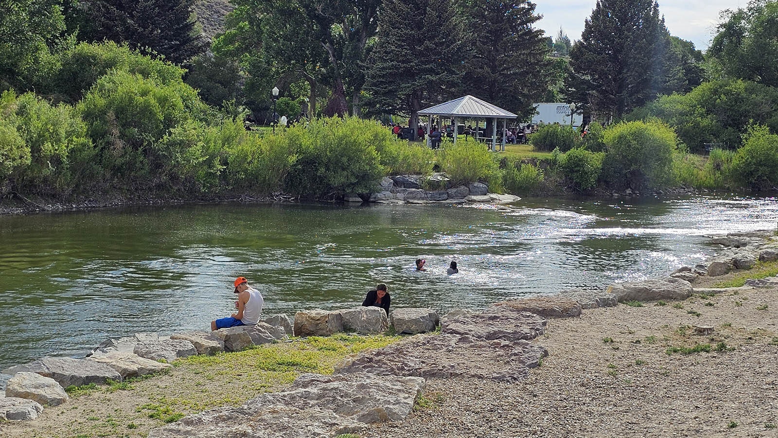 People sat on the river, or dove in and swam, Saturday during Flaming Gorge Days, while others gathered in Expedition Park to hear a number of bands play.