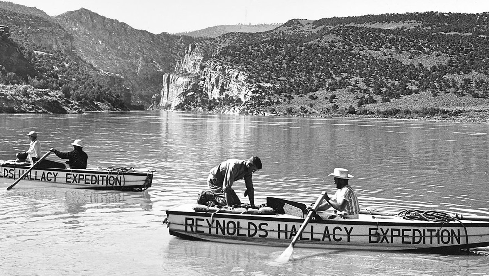 Boats on a Green River expedition prior to completion of the Flaming Gorge Dam.