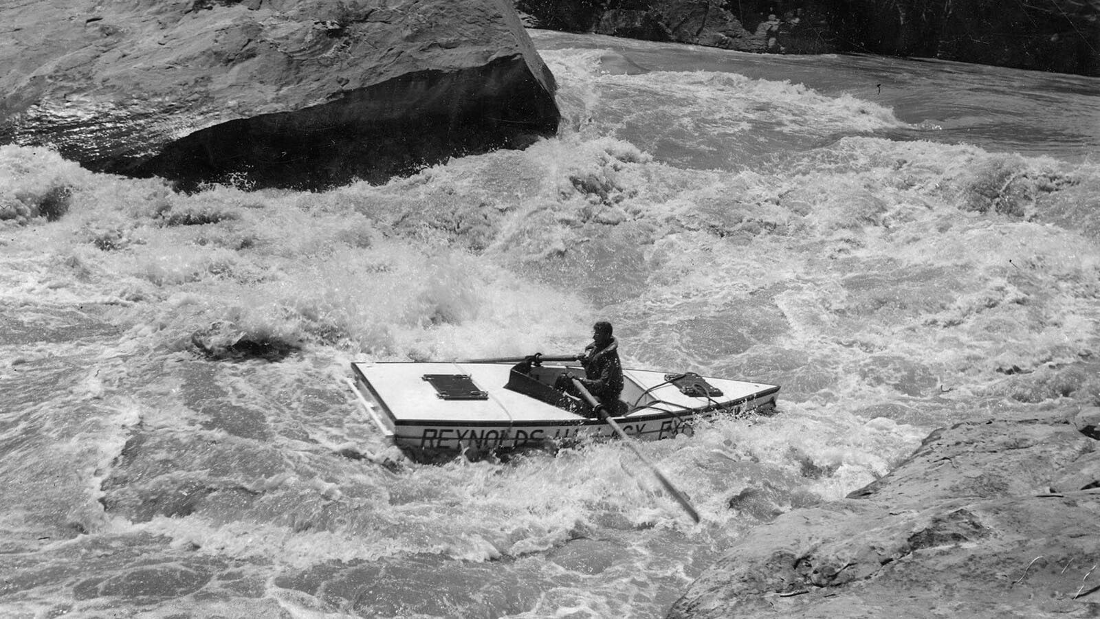 A cataract boat running Ashley Falls on the Green River prior to construction of Flaming Gorge Dam.