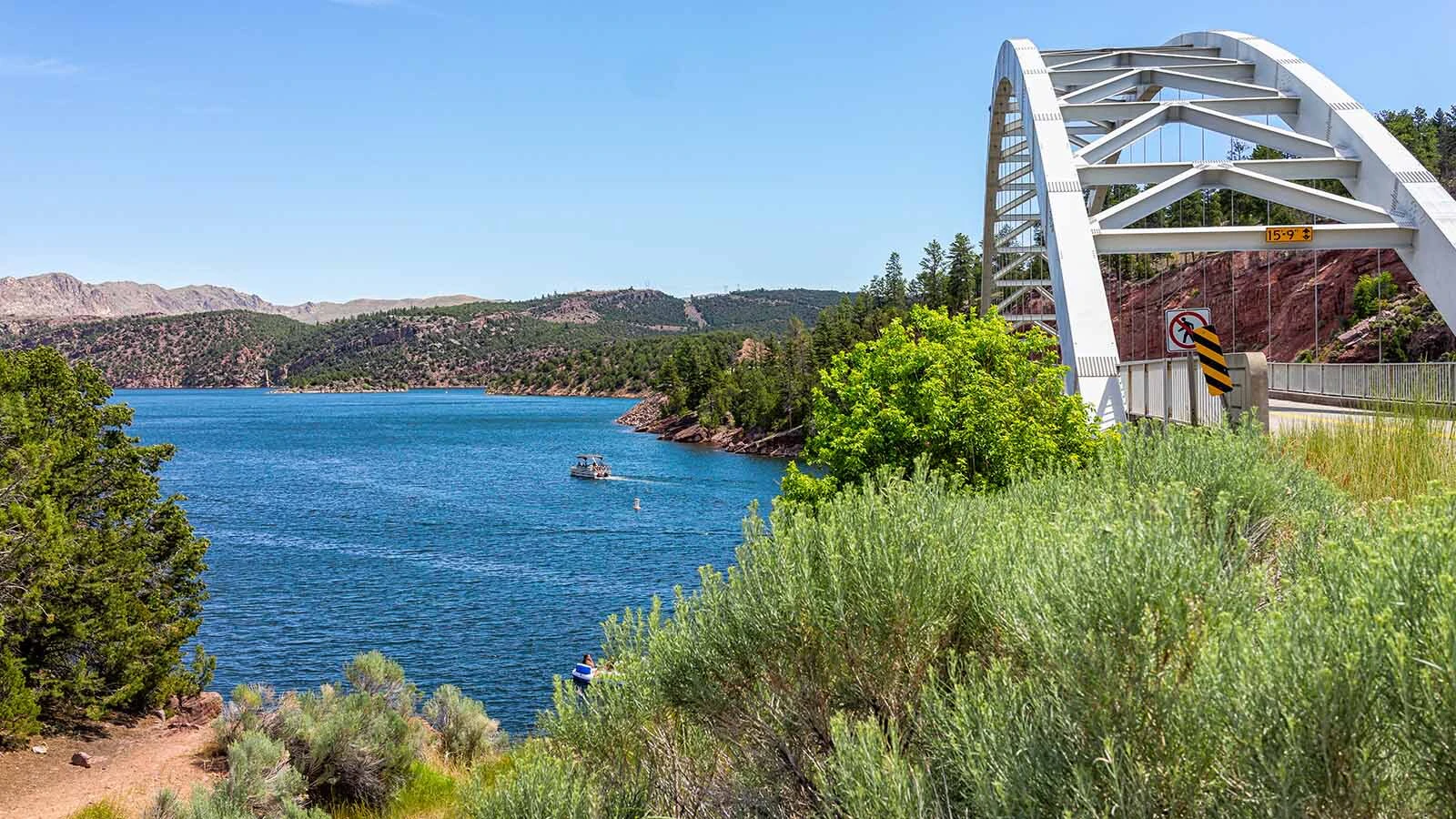 Divers who plunge the depths of the Colorado River and Flaming Gorge Reservoir find all kinds of treasure, from Old West six-shooters to cellphones. One woman burst into tears when given her phone back that had her grandchild’s birth video on it. Above, a veiw from Flaming Gorge Bridge.