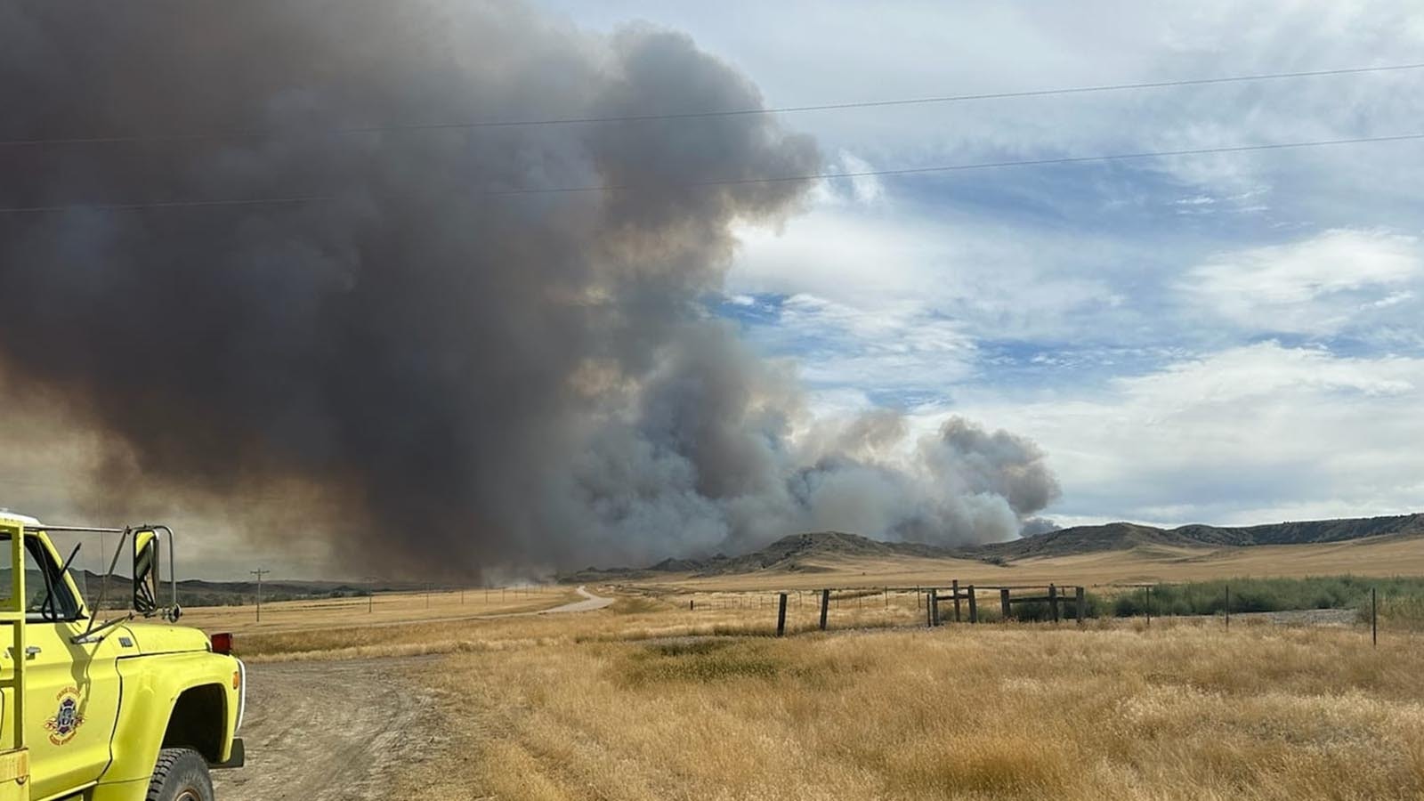 Thick smoke billows up from the Flat Rock Fire east of Gillette, Wyoming.