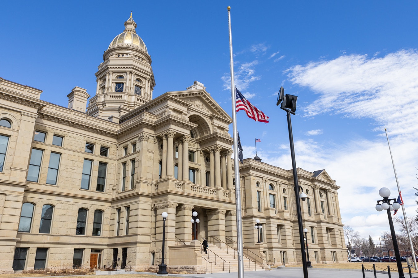 Flags at the Wyoming Capitol in Cheyenne are at half-staff in honor of Sheridan Police Sgt. Nevada Krinkee, who was shot and killed in the line of duty Feb. 13, 2024.