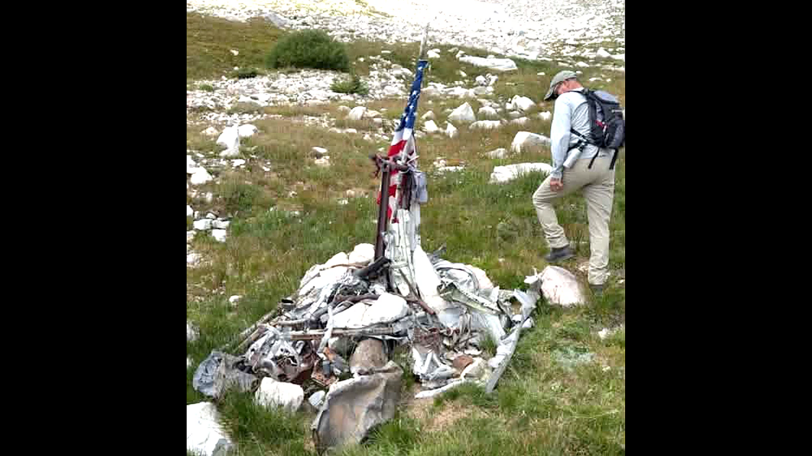 The flag was flying at the United Air Lines Flight 409 crash site in 2025.