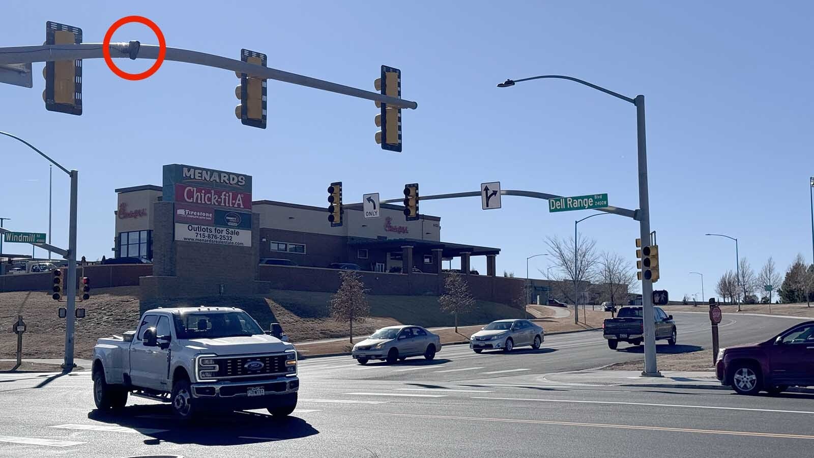 A petition has hundreds of signatures calling for Cheyenne to remove is Flock license plate cameras because they invade privacy. The city's police department says the 23 cameras are solving cases and catching criminals. Here, a camera can be seen in the upper left on a traffic light crossbar at the interseciton of Del Range Boulevard and Windmill Drive.