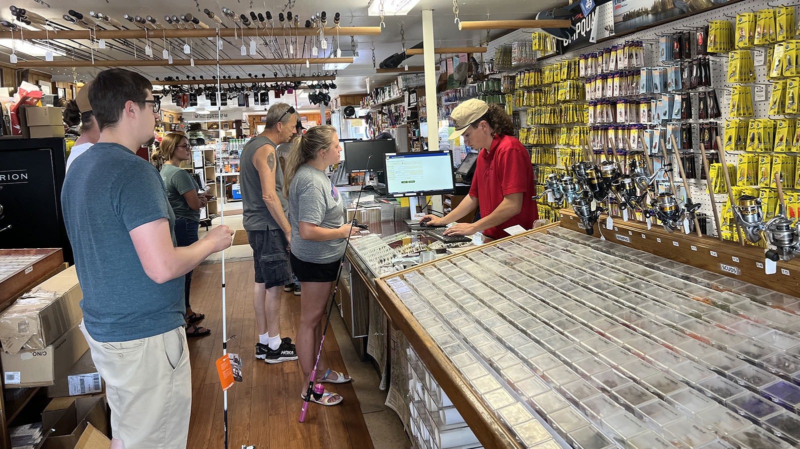 The West Laramie Fly Store in Laramie was hopping Friday afternoon, as people lined up to buy fishing licenses and tackle.