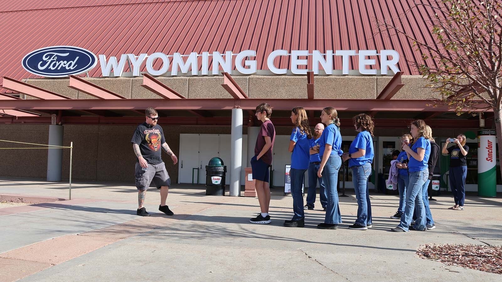 Members of the Shoshoni High School choir practice their walk up onto an imaginary stage.