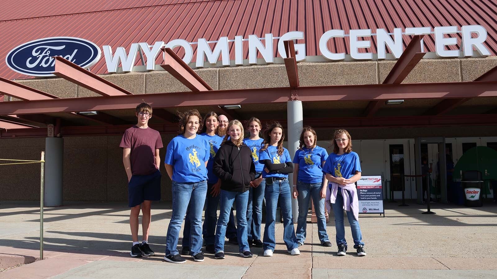 Members of the Shoshoni High School choir posed outside the Ford Wyoming Center on Tuesday. They are from left Travis McFarland, Brittney Sweeney, Alyssa Good, director Coulter Neale, Rhiannon Neale, Ella Pucel, Michelle Hughes, BreeAnna Sweeney, and Skylar Wintermote.