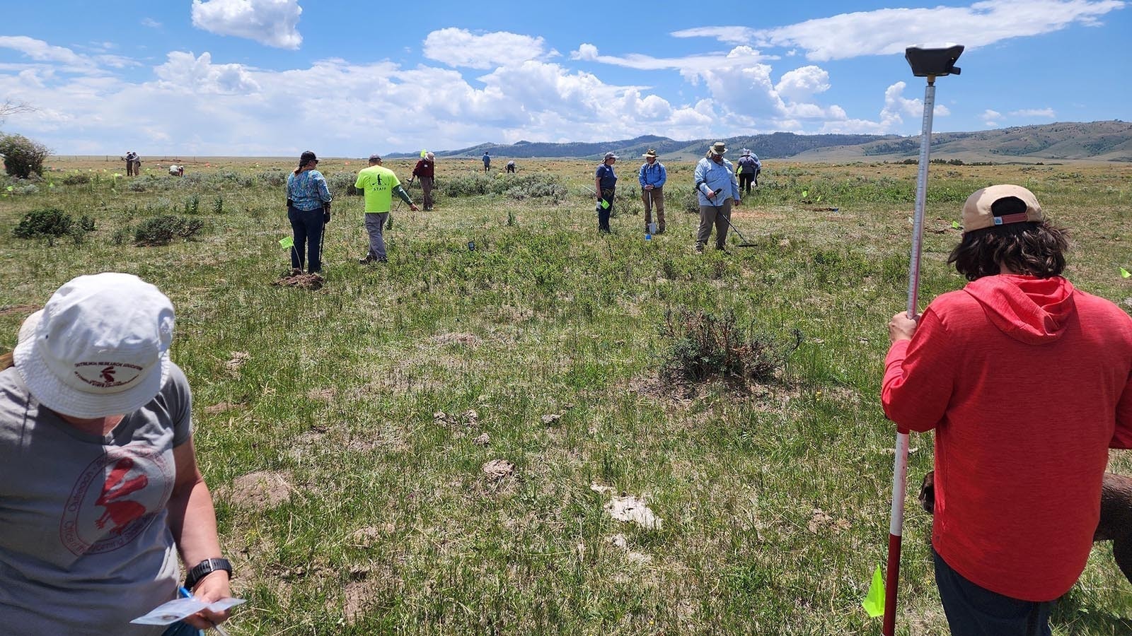 Archaeologists use obsidian to determine how far people traveled on ancient trade routes in early Wyoming. Each obsidian flake bears a unique volcanic fingerprint that points to their place of origin. Here, workers excavate a lost outpost in the Laramie Valley.