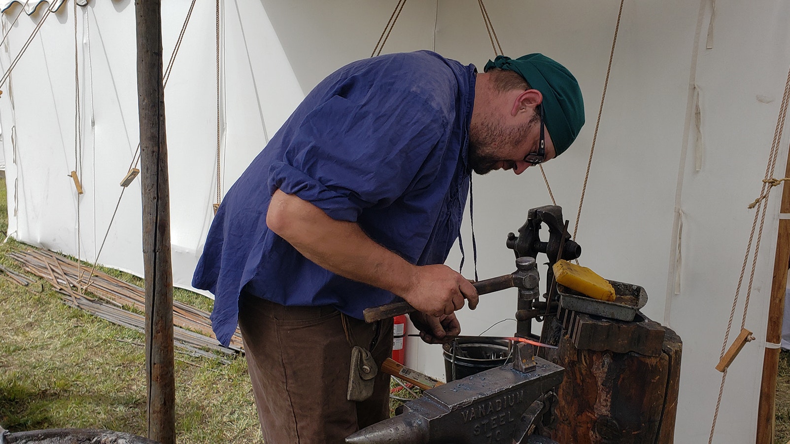 Blacksmith Jesse Colson pounds on a hot piece of metal at the recent Fort Bridger Rendezvous.