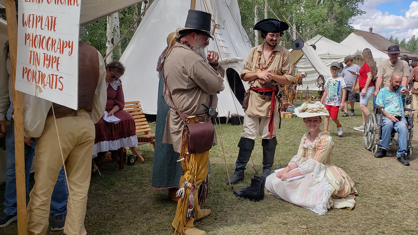 Tennessee Tarrant and Brianne Miller at Fort Bridger Rendezvous. Miller is wearing a 1700s-era Italian gown she made herself.