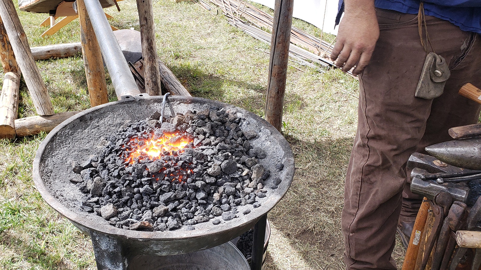 The color of the coals tells an experienced blacksmith how hot the coals are.