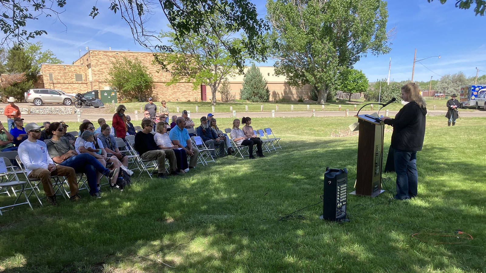 Historian and author Johanna Wickman talks to those gathered at Fort Caspar about the 11th Kansas Volunteer Cavalry and the cemetery project.