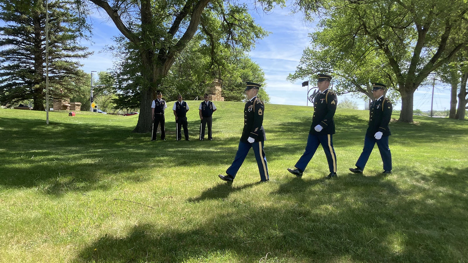 Members of the Wyoming Army National Guard march into place for a folded flag ceremony at Fort Caspar on Saturday.