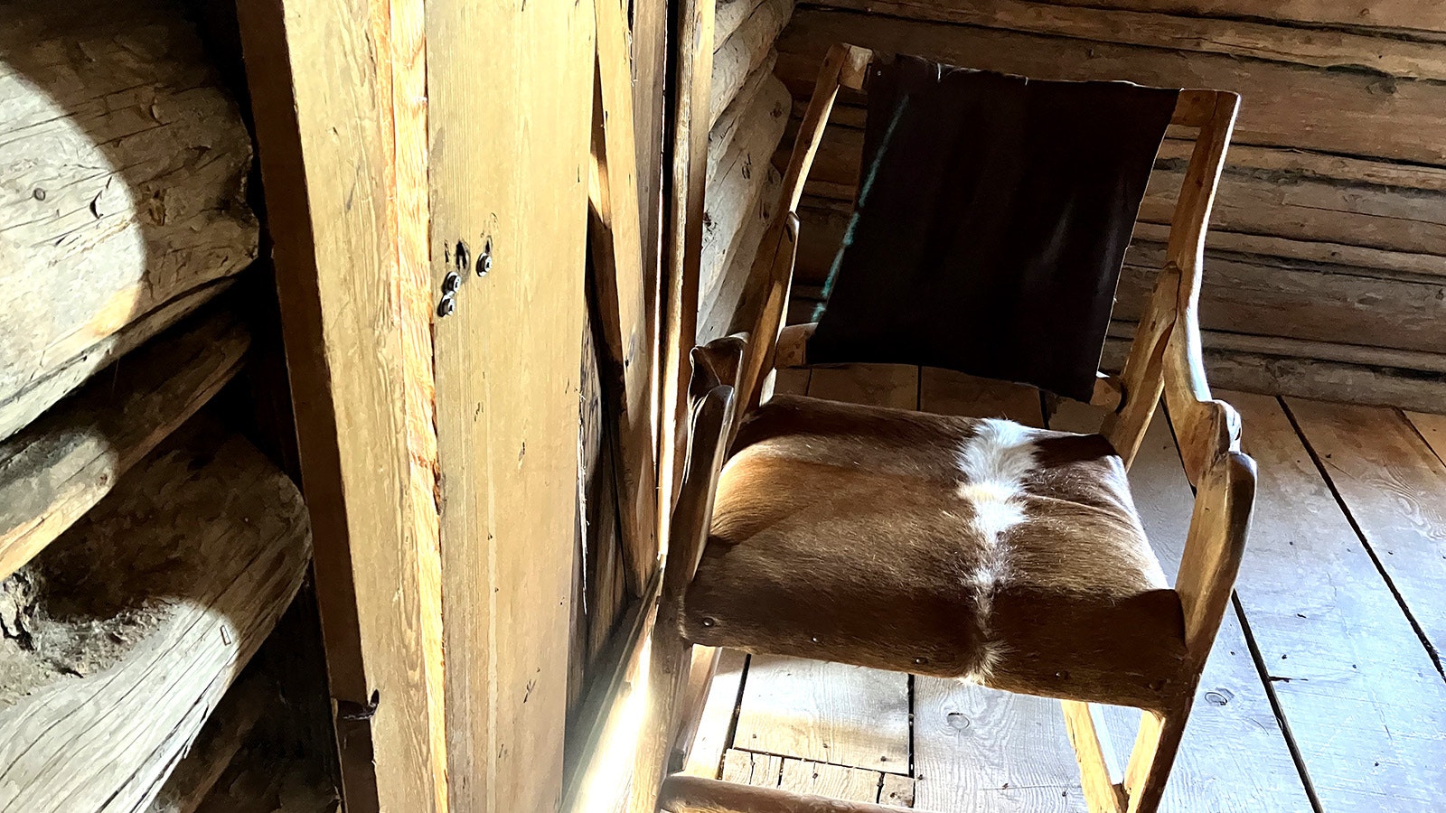 Museum Director Rick Young a few years ago found this chair blocking this door in the Sutler Store with no explanation for how it got there. The door opens in and is the only entrance. Windows are nailed shut from the inside.