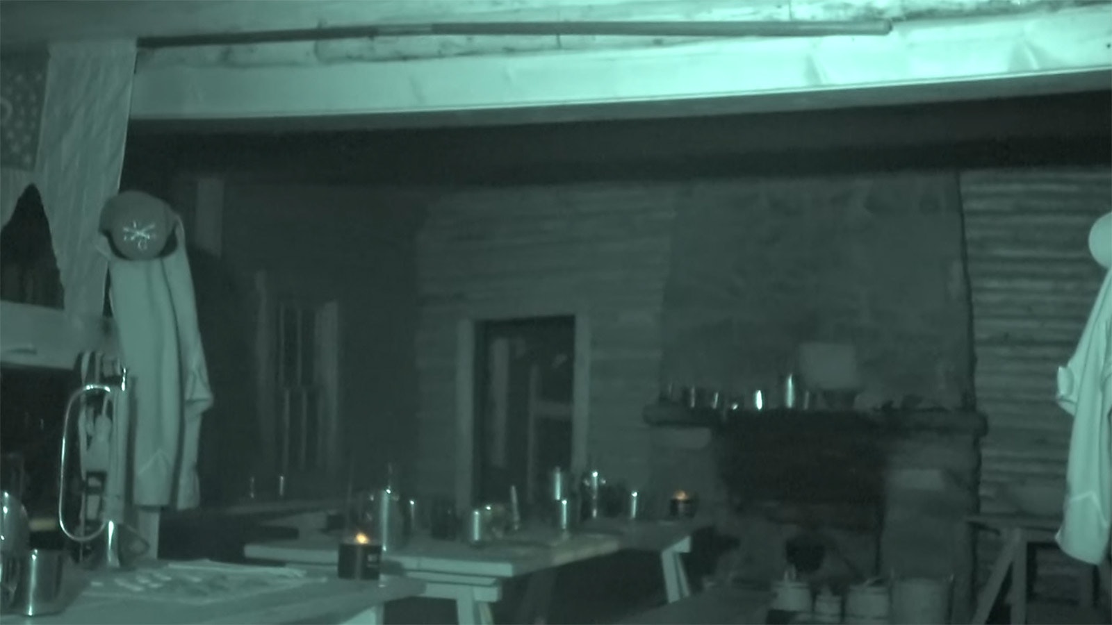 This screenshot from a 30-minute video shows infrared football from the Fort Caspar cavalry barracks. The paranormal detection devices on the tables are triggered multiple times.