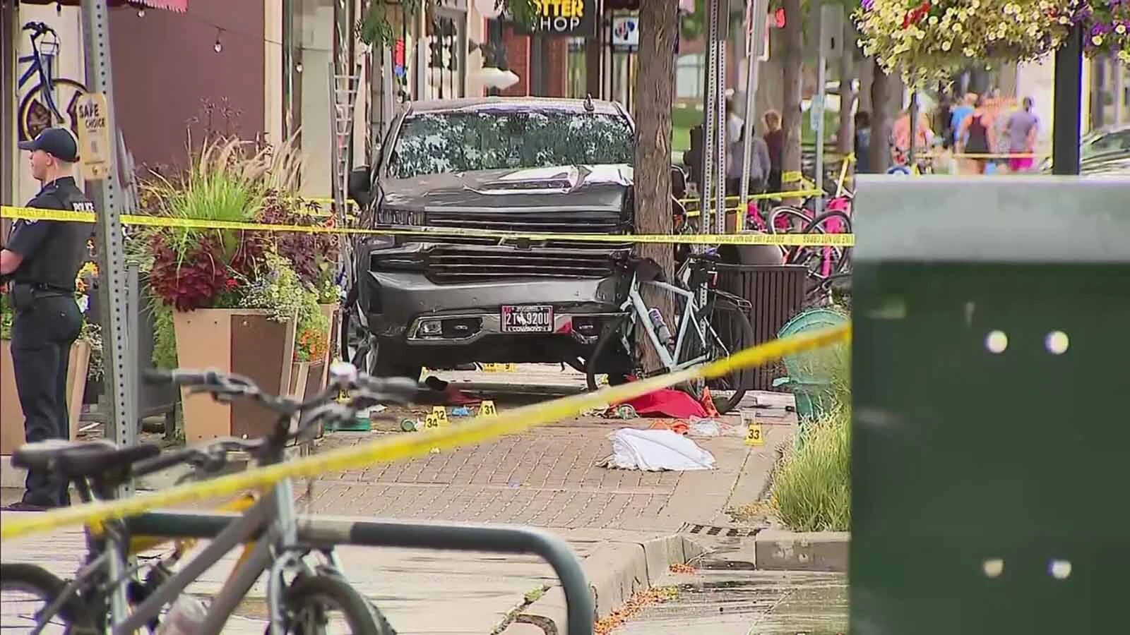 The site in front of a Fort Collins, Colorado, ice cream shop where Denver man Josh Douglass was killed Aug. 29, 2026, when a Chevy Silverado jumped the curb and plowed into a group of pedestrians.