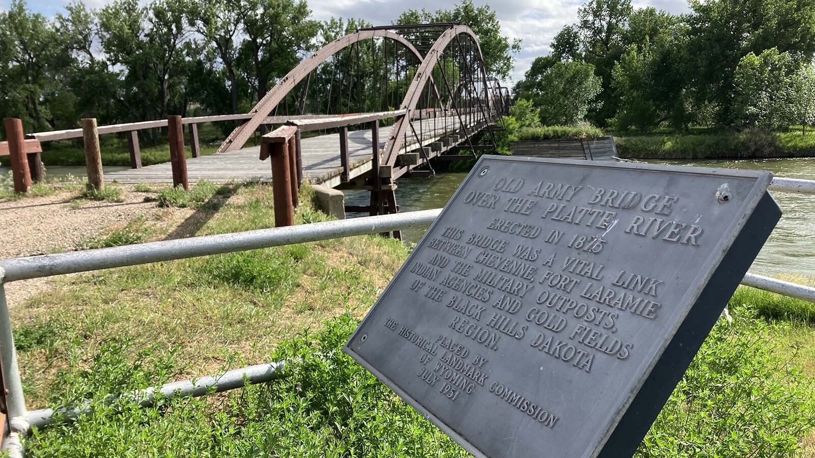 The Old Army Bridge aka Fort Laramie Bridge across the North Platte River still allows pedestrians to stroll its planks and imagine the history that occurred on the 420-foot structure.