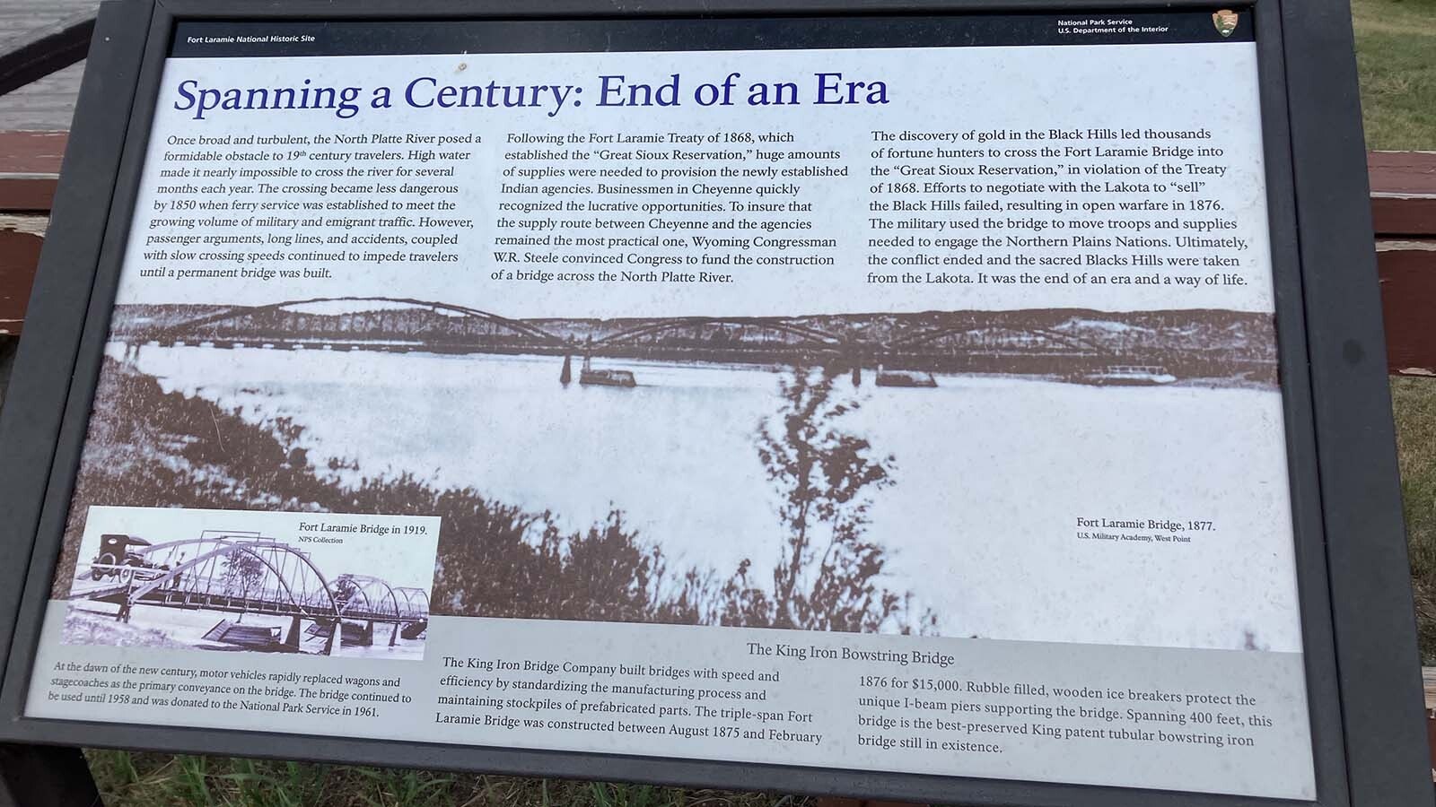 A sign on the south side of the Fort Laramie Bridge details part of its history.