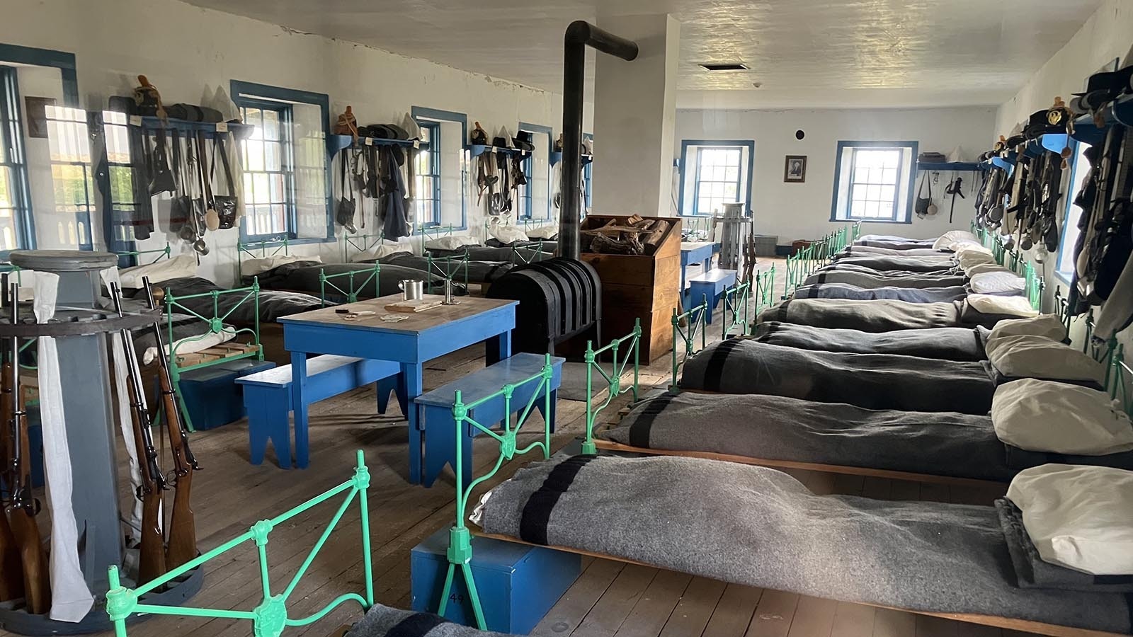 Rows of bunks on the second floor of the Cavalry Barracks depict how soldiers lived on the western frontier.