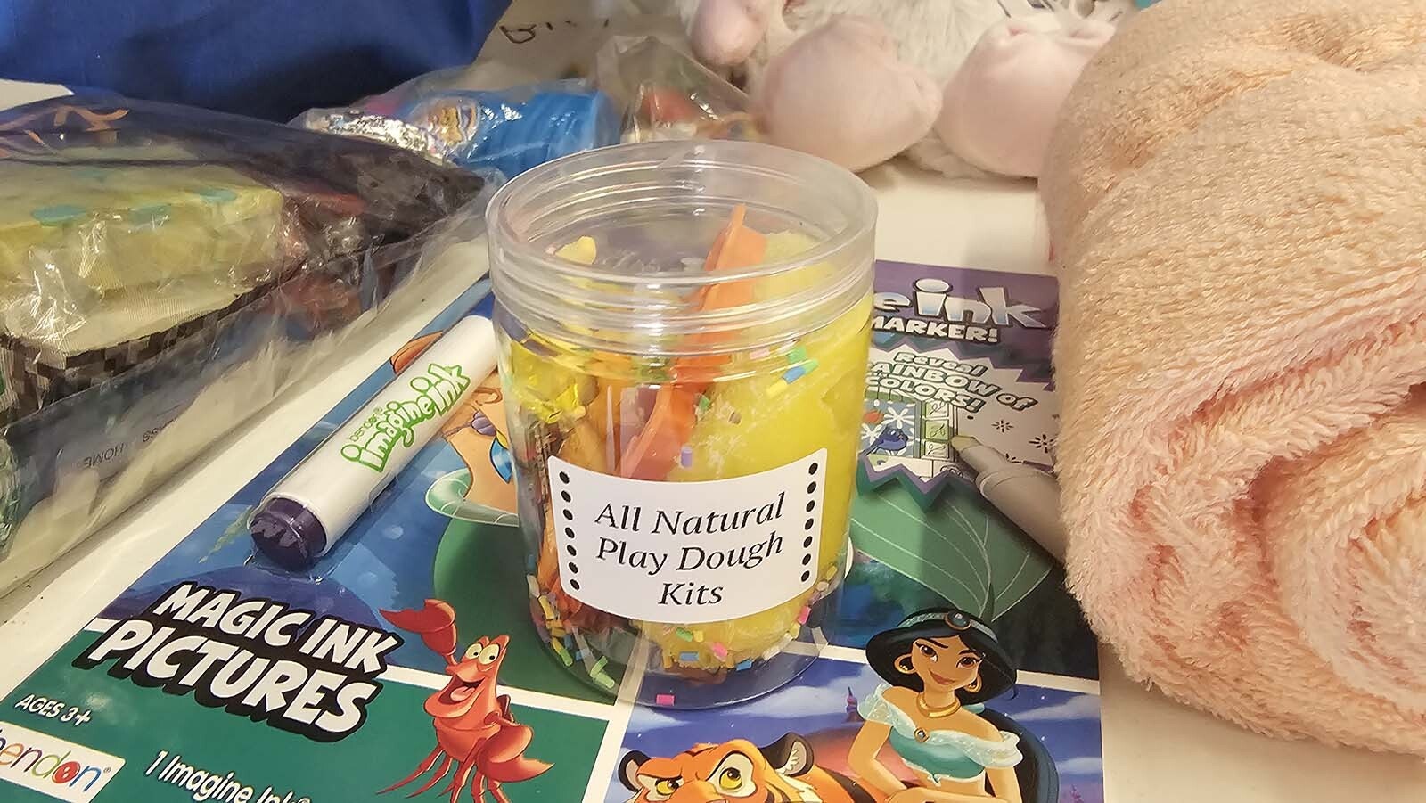All natural playdough that came from a local business is among items going into an overnight bag for foster care children.