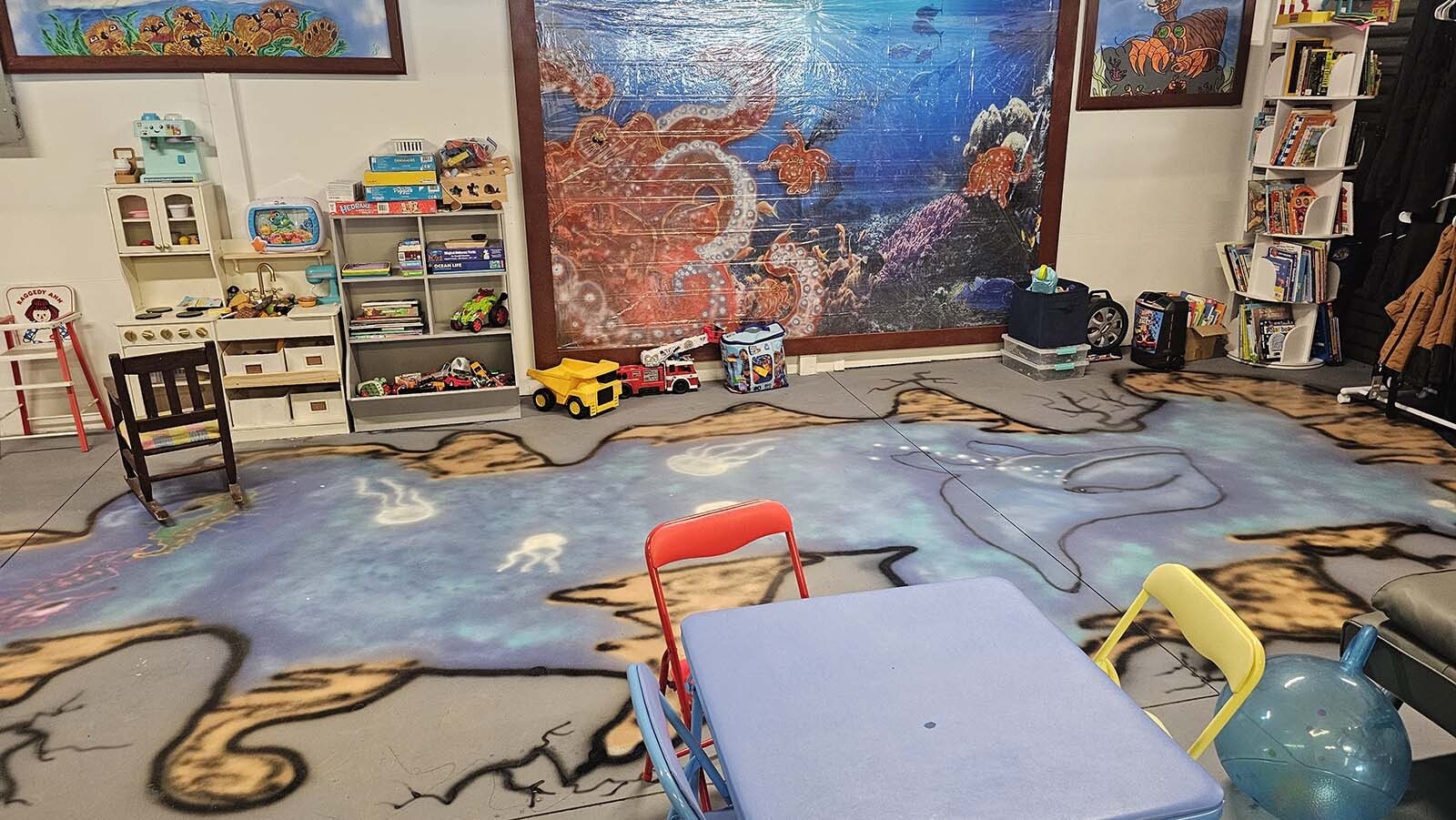 This area was painted by a former foster care child, and creates a space that Crayton said children just love.