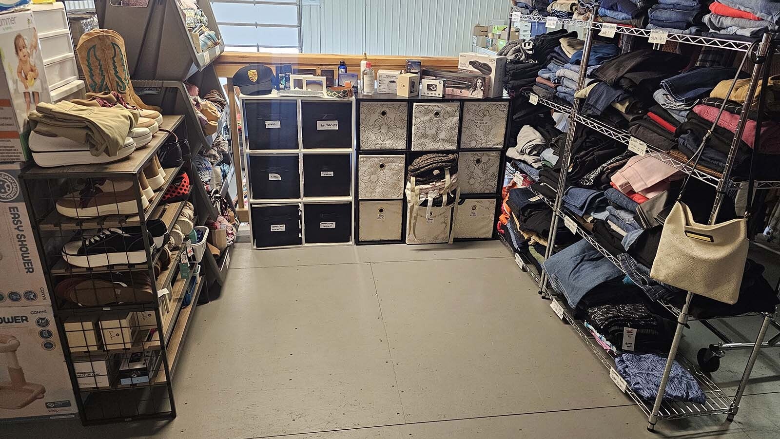 Jeans, hats, shoes, curling irons, purses — everything a teenage girl might need or want, inside the Sheridan Foster Care Exhange's shopping area.